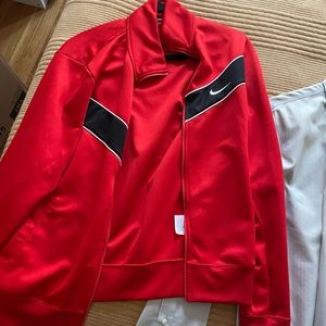 Light Nike track jacket. Great condition with a vintage look and feel.